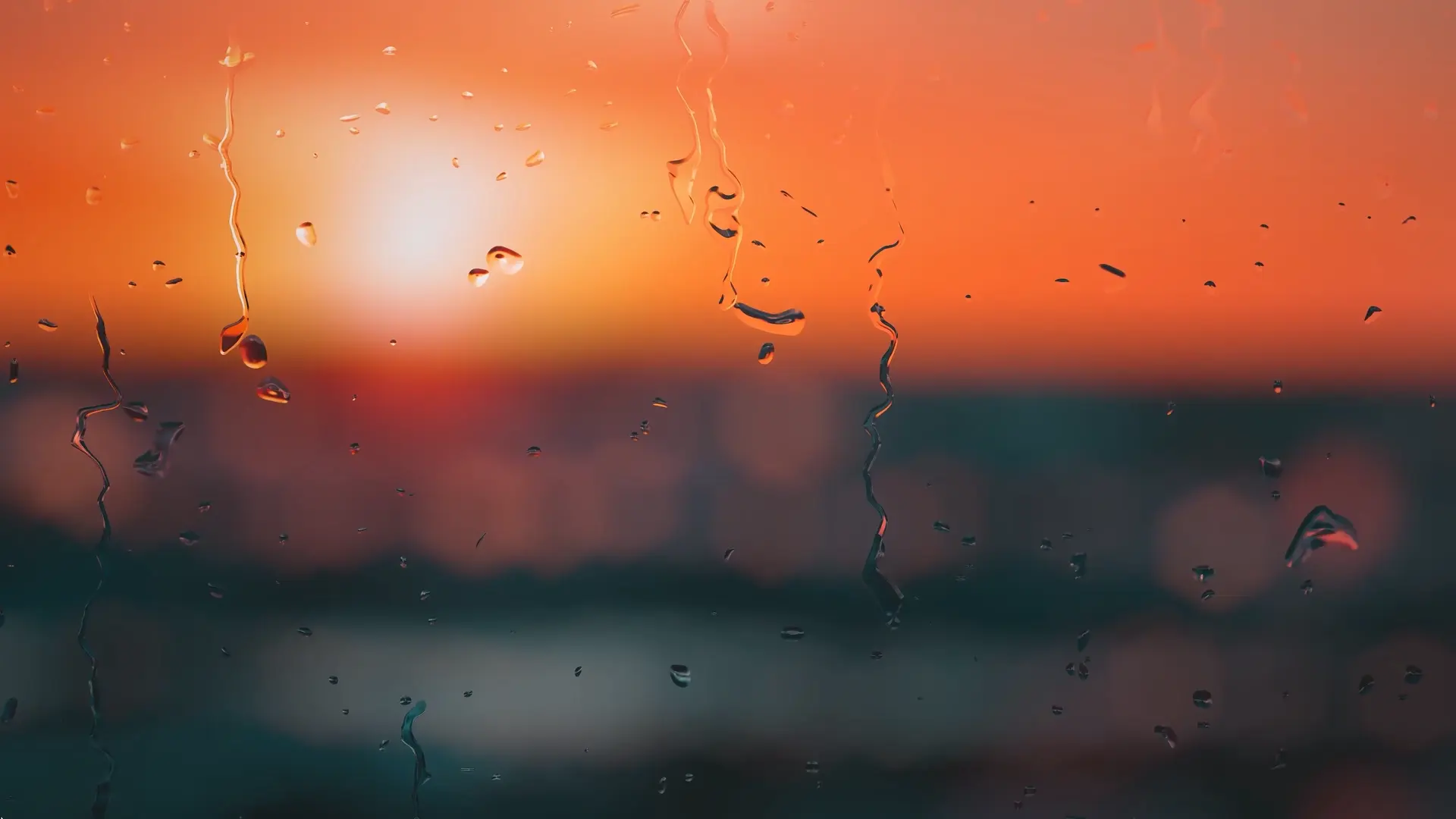Rain on Glass at Sunset live wallpaper for desktop